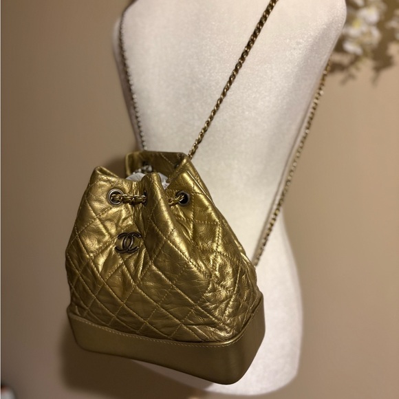 CHANEL Gold Quilted Backpack - Picture 1 of 13